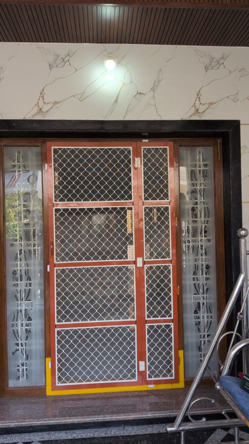 Premium Aluminium Mesh Door Installation - Prashanth Aluminium Works